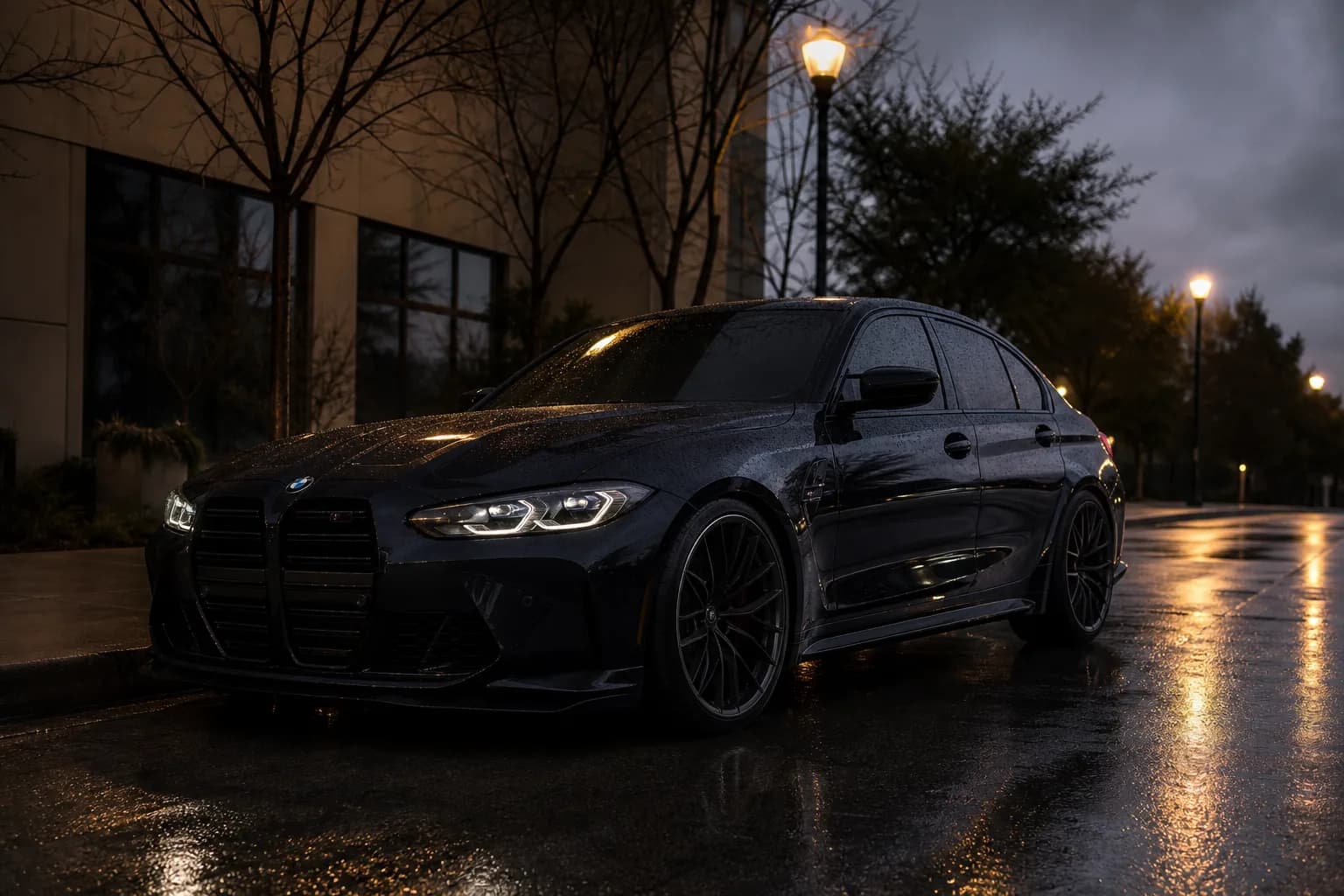 Dark car parked on a quiet wet street at dusk
